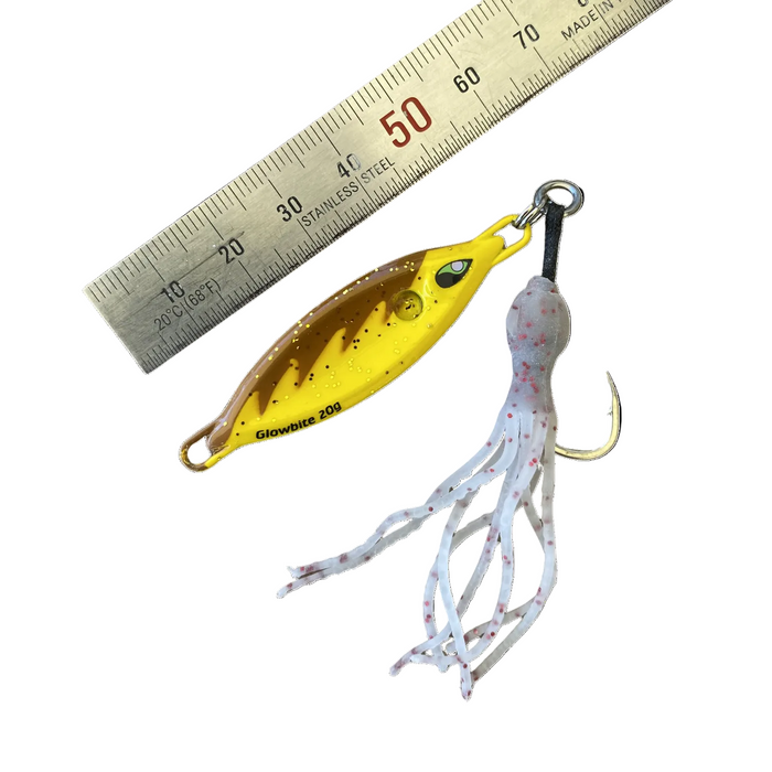very small yellow lure with white squid skirt