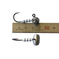 Very small strong jig head hooks shown with ruler